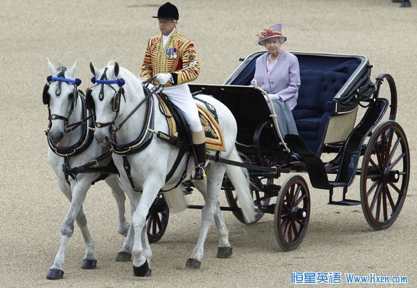 Britain's Queen Elizabeth rides in an open carriage as she attends the Trooping the Colour ceremony in London June 12, 2010. (Xinhua/Reuters Photo) Britain's Queen Elizabeth rides in an open carriage as she attends the Trooping the Colour ceremony in London June 12, 2010. (Xinhua/Reuters Photo)