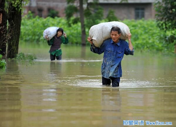 Villagers carry their belongings in the flood at Shanglang Village of Gupeng Township in Xincheng County in south China's Guangxi Zhuang Autonomous Region, June 2, 2010. (Xinhua/Zhou Hua) Villagers carry their belongings in the flood at Shanglang Village of Gupeng Township in Xincheng County in south China's Guangxi Zhuang Autonomous Region, June 2, 2010. (Xinhua/Zhou Hua)