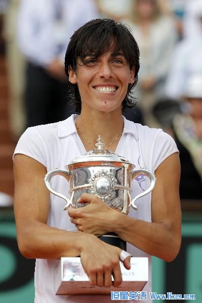 Francesca Schiavone of Italy poses with her trophy after winning the women's final against Samantha Stosur of Australia during their women's final at the French Open tennis tournament at Roland Garros in Paris June 5, 2010. (Xinhua/Reuters Photo)
