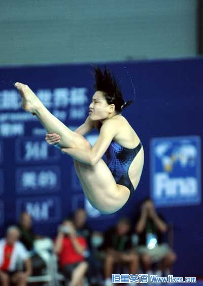 China's He Zi scored her first world title in the women's 3 meters springboard while her Olympic champion teammate Wu Minxia missed her third World Cup title in a row here on Saturday. (Xinhua Photo)