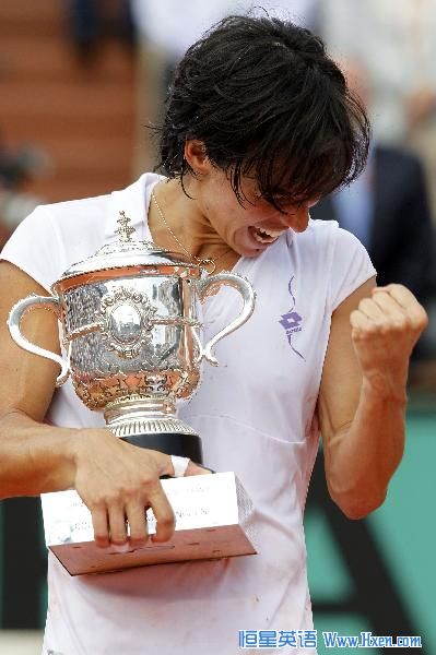 Francesca Schiavone of Italy poses with her trophy after winning the women's final against Samantha Stosur of Australia during their women's final at the French Open tennis tournament at Roland Garros in Paris June 5, 2010.  