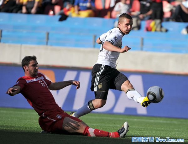Germany's Lukas Podolski (R) shoots during the 2010 World Cup Group D soccer match between Germany and Serbia at the Nelson Mandela Bay stadium in Port Elizabeth, South Africa, on June 18, 2010. Germany lost the match 0-1. (Xinhua/Yang Lei)