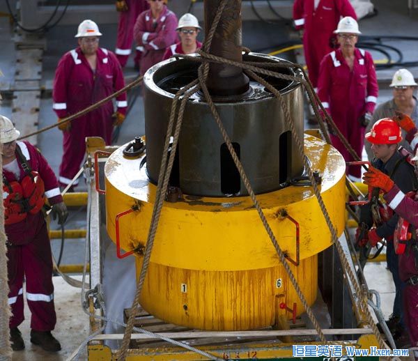 Workers onboard the Transocean Discoverer Inspiration retrieve the flange overshot tool used to remove the flange from the Deepwater Horizon BOP, July 11, 2010 in the Gulf of Mexico. (Xinhua/Reuters Photo) Workers onboard the Transocean Discoverer Inspiration retrieve the flange overshot tool used to remove the flange from the Deepwater Horizon BOP, July 11, 2010 in the Gulf of Mexico. (Xinhua/Reuters Photo)