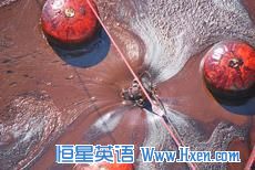 Coast Guard Cutter Cypress' skimmer hard at work in a large patch of oil in the Gulf of Mexico.  