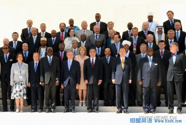 Wu Bangguo (4th R, Front), chairman of the Standing Committee of China's National People's Congress (NPC), poses for a group photo with other participants of the third World Conference of Speakers of Parliament held in Geneva, Switzerland, July 19, 2010.      (Xinhua/Zhang Duo)(wy)  