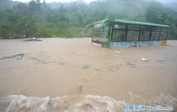 A bus is trapped on a flooded street in Chizhou, east China's Anhui Province, July 13, 2010. (Xinhua/Guo Chen) A bus is trapped on a flooded street in Chizhou, east China's Anhui Province, July 13, 2010. (Xinhua/Guo Chen)