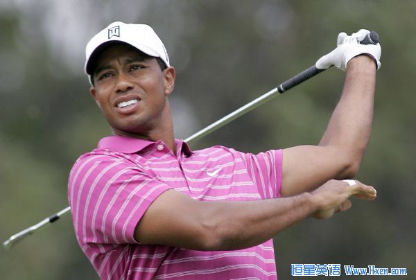 Woods lets go of his club during the first round of the BMW Championship golf tournament in Lemont Tiger Woods of the U.S. lets go of his club after hitting a tee shot on the eighth hole during the first round of the BMW Championship golf tournament in Lemont, Illinois September 9, 2010. (Xinhua/Reuters)