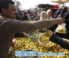 Egyptians shop at a vegetable market in Cairo on February 6, 2011. 