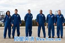 At NASA's Kennedy Space Center in Florida, space shuttle Discovery's STS-133 crew on the Shuttle Landing Facility runway. 
