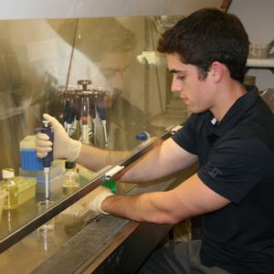 Scott Boisvert, 18, studies a fungus linked to the decline of amphibians worldwide. He placed 10th at the Intel Science Talent Search.  
