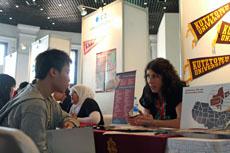 A recruiter answers questions from an Indonesian student looking to <a href=http://www.hxen.com target=_blank class=infotextkey>study</a> in the US, at a US education fair sponsored by the US Embassy in Jakarta, April 4, 2011