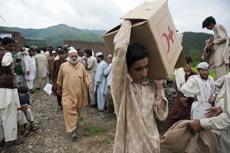Supplies are distributed to 400 families in Pakistan's Swat valley. All of them lost their homes to flooding in 2010.  