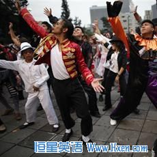 Thousands of people perform at the Monument of the Revolution in Mexico City, during an attempt to break the Guinness World Record of people dancing Michael Jackson's Thriller, in 2009. The event was organized in honor of the late pop star's birthday.