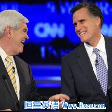 Former Massachusetts governor Mitt Romney, right, answers a question during the first New Hampshire Republican presidential debate on June 13, 2011.