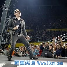 Lead singer Bono of Irish rock band U2 performs during their 360 Degree Tour (file photo)