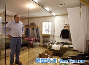 Steve Leger, executive director of the Heart Mountain Interpretive Learning Center, stands in a replica of a lived-in barracks room. 