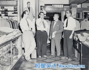 Howard Miller (left) with family members in the men's casual pants department, believed to have been taken in the 1950s.  