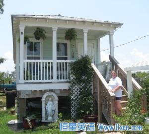 Cheryl Kring's rebuilt home in Waveland, Mississippi is one block from the beach. The elevated house is typical of the new landscape along the Mississippi Gulf Coast. 