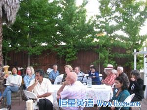 Guests gather for a meal at the home of  American Muslim <a href=http://www.hxen.com/englishlistening/ target=_blank class=infotextkey>voice</a> founder Samina Sundas.            