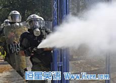 Riot police spray tear gas at demonstrators during clashes in Athens' Syntagma [Constitution] square, October 19, 2011.