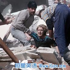 People rescue a woman trapped under debris after a powerful 7.2-magnitude earthquake struck eastern Turkey, collapsing about 45 buildings in Van province,October 23, 2011.