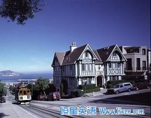 A San Francisco cable car - the nation��s only moving national monument, ascends hilly Hyde Street.   