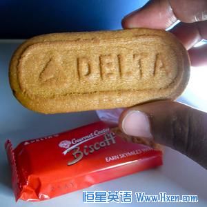 A typical in-flight &ldquo;meal&rdquo; these days. On the wrapper, note the ad promoting the airline&rsquo;s frequent-flier program.  