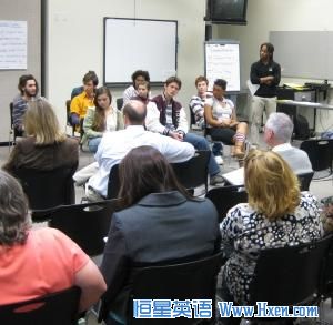 A student actor shares his character&rsquo;s reactions with participants. Skyler Jackson (R-standing) leads the Creating Bias-Free Classrooms teacher training.