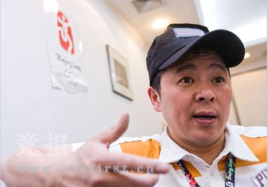 Wang Pingjiu looks back at Campaign to solicit songs for the Games